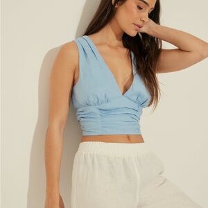 Bow detail linen top blue